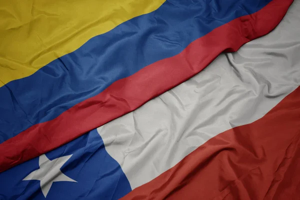 Waving colorful flag of chile and national flag of colombia. — Stock Photo, Image