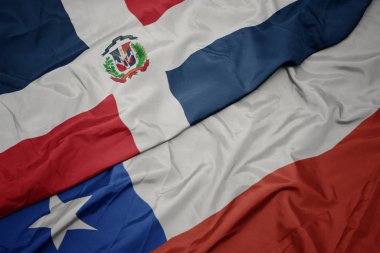 şili ve Dominik Cumhuriyeti ulusal bayrağı renkli bayrak sallayarak.