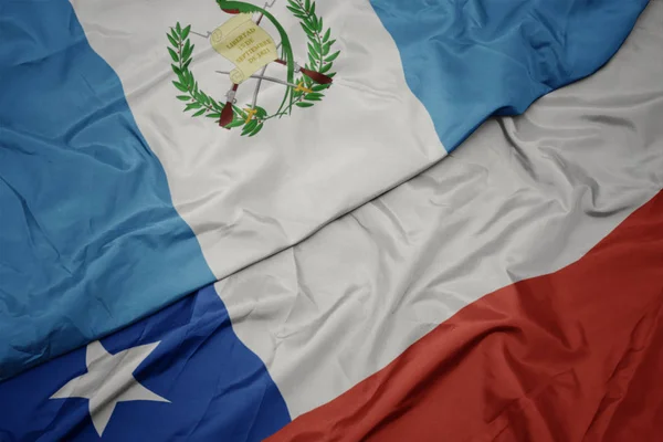 Fluturând steagul colorat al chilei și drapelului național al guatemalei . — Fotografie, imagine de stoc