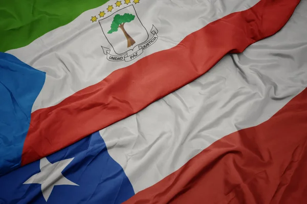 칠레의 화려한 국기와 적도 기니의 국기를 흔들어. — 스톡 사진