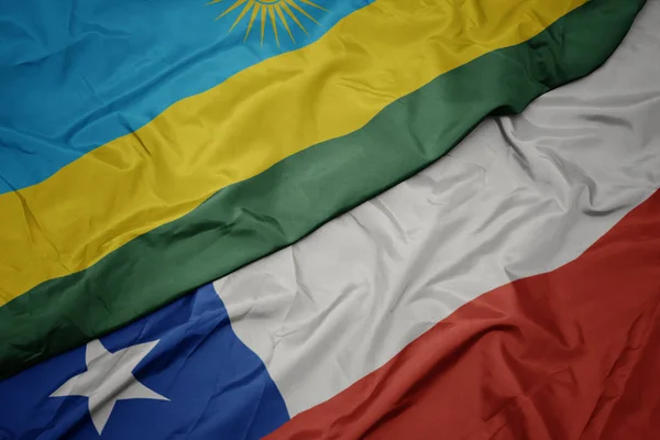 Chile színes zászlója és Ruanda nemzeti zászlaja. — Stock Fotó