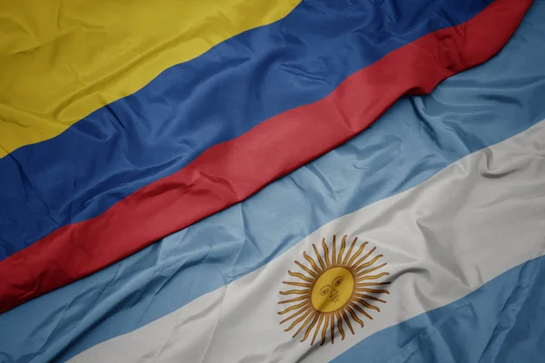 Vifta färgglada flagga Argentina och nationella flaggan i Colombia. — Stockfoto