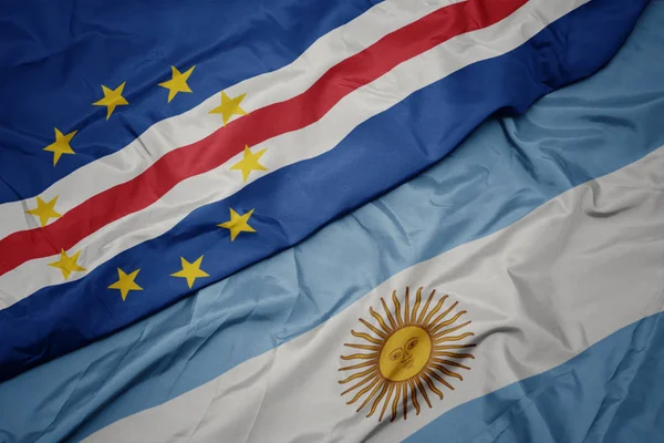 Waving colorful flag of argentina and national flag of cape verde. — Stock Photo, Image