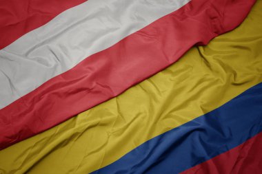 kolombiya ve avusturya ulusal bayrağı renkli bayrak sallayarak.