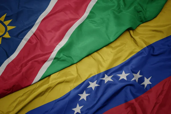 Vifta färgglada flagga Venezuela och nationella flaggan i Namibia. — Stockfoto