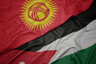 ürdün ve Kırgızistan ulusal bayrağı renkli bayrak sallayarak.