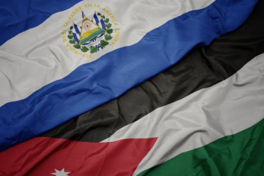 ürdün ve el salvador ulusal bayrağı renkli bayrak sallayarak.