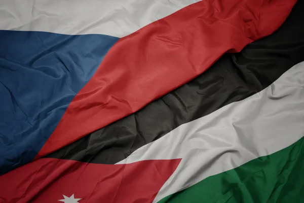 Acenando bandeira colorida da Jordânia e bandeira nacional da República Checa . — Fotografia de Stock