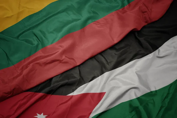 A Jordán zászló színpompás zászlója és Litvánia nemzeti zászlaja. — Stock Fotó