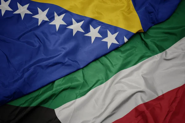 Waving colorful flag of kuwait and national flag of bosnia and herzegovina. — Stock Photo, Image