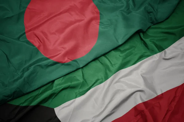 Sventolando bandiera colorata del Kuwait e bandiera nazionale del Bangladesh . — Foto Stock