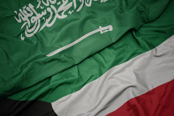 Waving colorful flag of kuwait and national flag of saudi arabia. — Stock Photo, Image