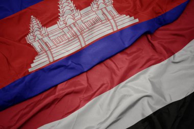 yemen ve kamboçya ulusal bayrağı renkli bayrak sallayarak.