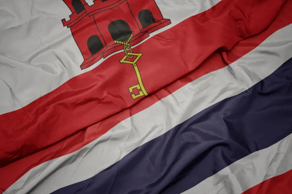 Thaiföld és Gibraltár nemzeti zászlaja. — Stock Fotó