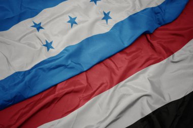 yemen ve honduras ulusal bayrağı renkli bayrak sallayarak.
