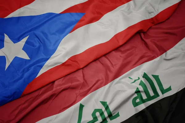 Falujące kolorowe flagi Iraku i flagi narodowej Portoryko. — Zdjęcie stockowe