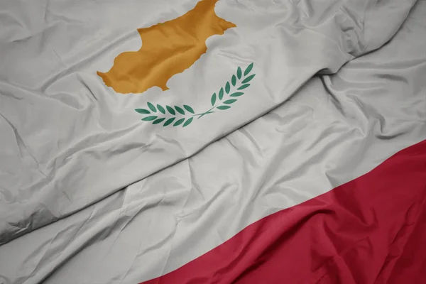 Acenando bandeira colorida de polônia e bandeira nacional de cyprus . — Fotografia de Stock