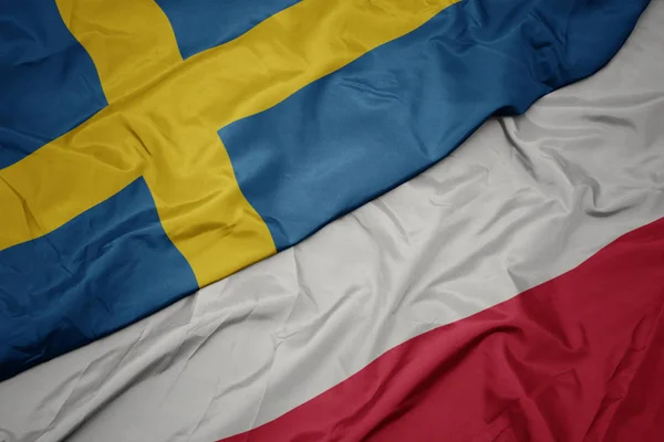 A lengyelországi zászló és Svédország nemzeti zászlaja. — Stock Fotó