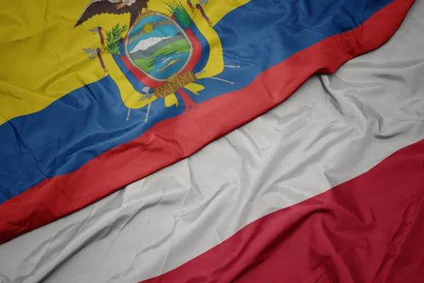 Vifta färgglada flagga av Polen och nationella flaggan i Ecuador. — Stockfoto