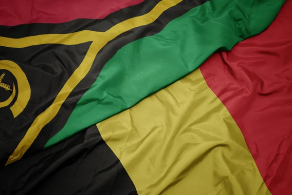 Ondeando colorida bandera de Bélgica y bandera nacional de Vanuatu  . —  Fotos de Stock