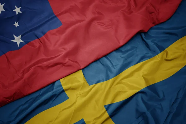 Waving colorful flag of sweden and national flag of Samoa . — Stock Photo, Image