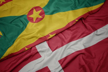 Danimarka 'nın renkli bayrağı ve Grenada' nın ulusal bayrağı.