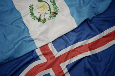 İzlanda 'nın renkli bayrağı ve Guatemala' nın ulusal bayrağı sallanıyor..