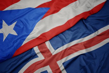 İzlanda 'nın renkli bayrağı ve Porto Riko' nun ulusal bayrağı sallanıyor..