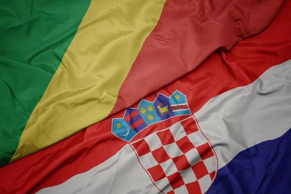 Waving colorful flag of croatia and national flag of republic of the congo. — Stock Photo, Image