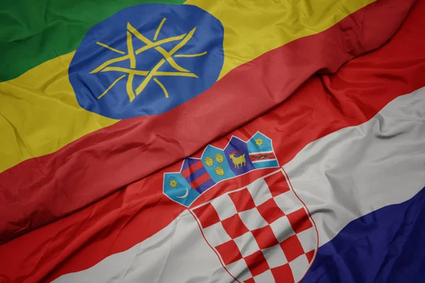 Waving colorful flag of croatia and national flag of ethiopia . — Stock Photo, Image