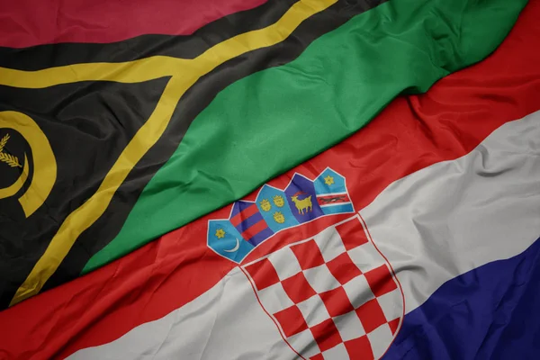 Waving colorful flag of croatia and national flag of Vanuatu . — Stock Photo, Image