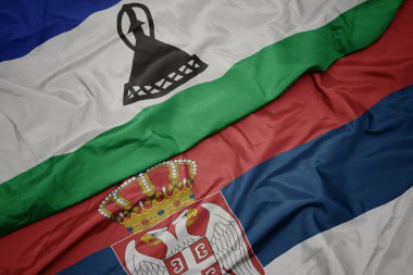 Sırbiya 'nın renkli bayrağı ve lesotho' nun ulusal bayrağı sallanıyor..
