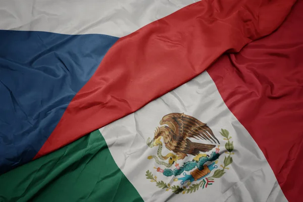 Zwaaiende vlag van Mexico en nationale vlag van de Tsjechische Republiek. Macro — Stockfoto