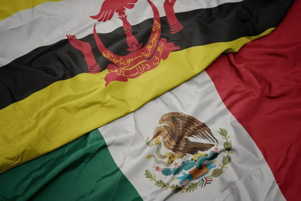 Viftande färgglada flagga mexico och nationell flagga brunei. makro — Stockfoto