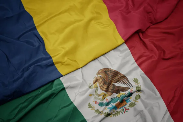 Acenando bandeira colorida do méxico e bandeira nacional de chad. macro — Fotografia de Stock