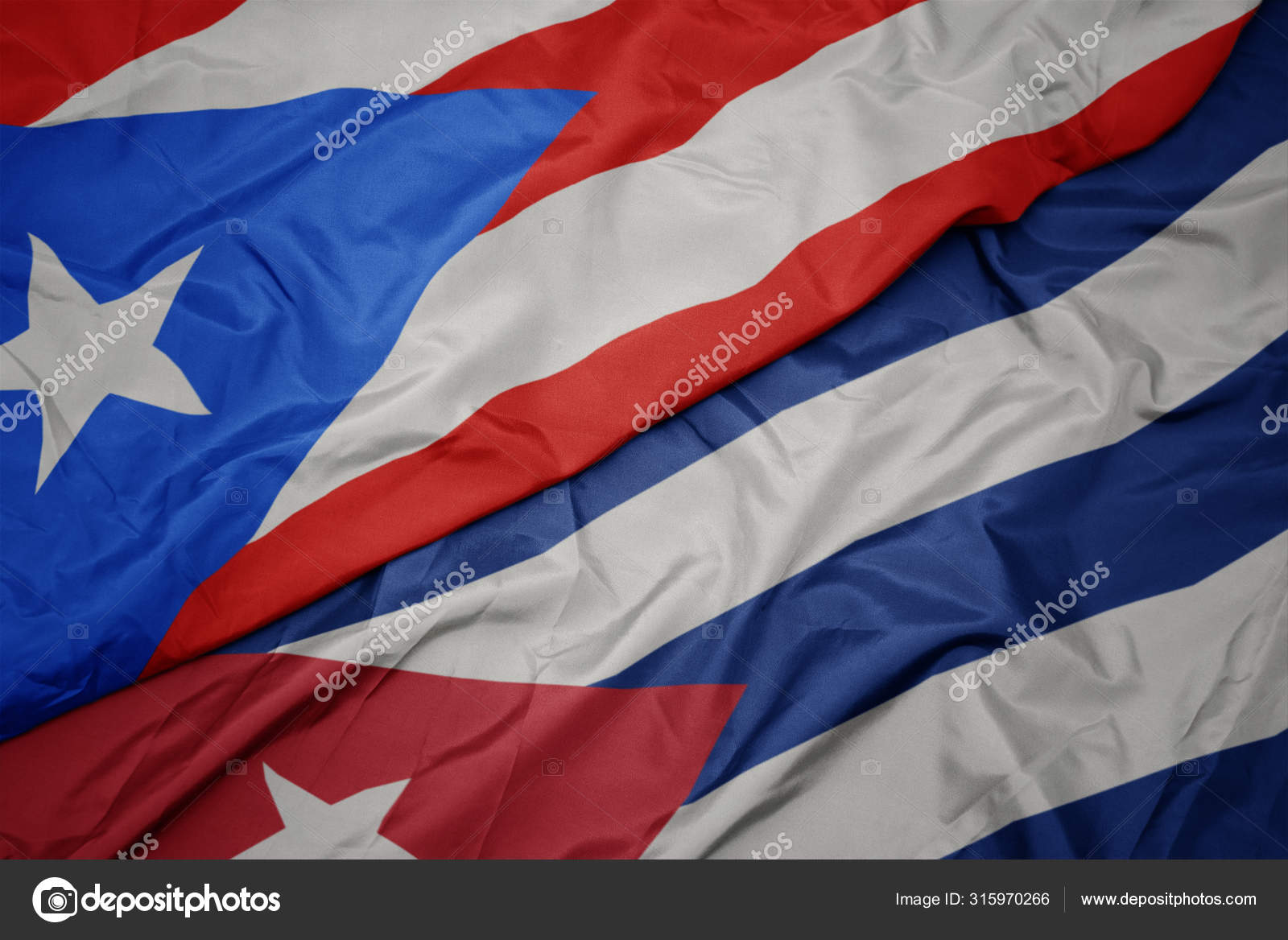 Agitant drapeau coloré de cuba et drapeau national de puerto rico