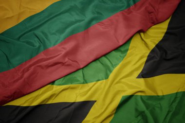 Jamaika 'nın renkli bayrağı ve Litvanya' nın ulusal bayrağı sallanıyor..