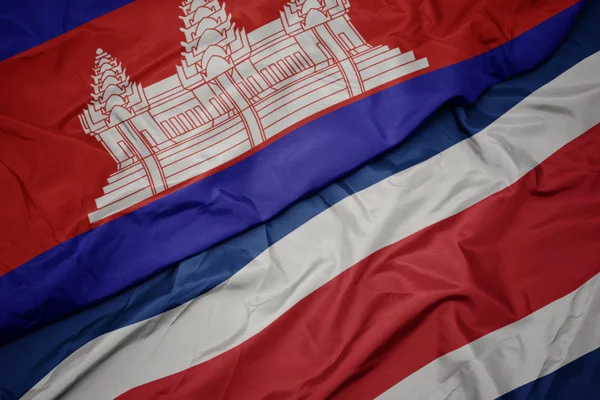 Waving colorful flag of costa rica and national flag of cambodia. — Stock Photo, Image