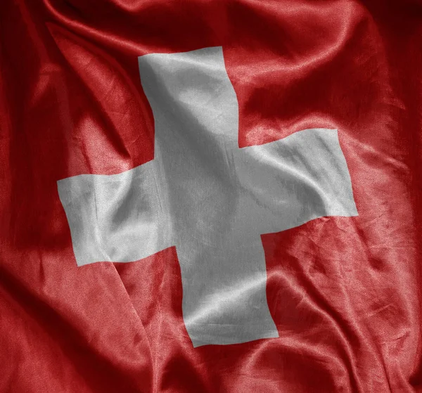 Mává Barevně Zářící Velkou Národní Vlajkou Švýcarska Hedvábné Textuře — Stock fotografie