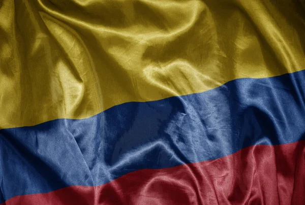 Zwaaiende Kleurrijke Glanzende Grote Nationale Vlag Van Colombië Een Zijdezachte — Stockfoto