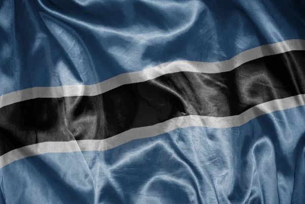 カラフルなボツワナの国旗を絹のような質感で振って — ストック写真