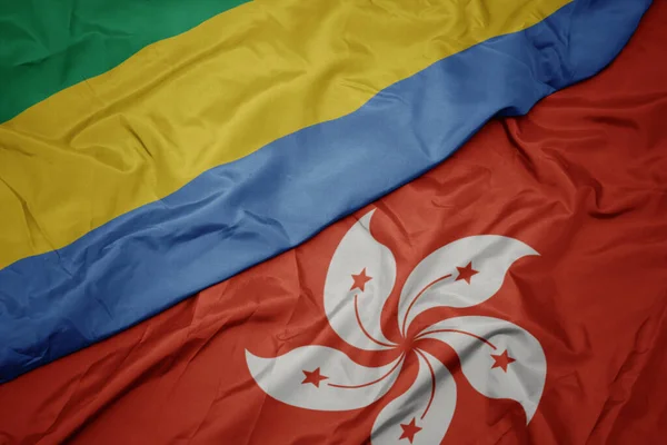 Hong Kong Renkli Bayrağı Gabon Ulusal Bayrağı Sallanıyor Makro — Stok fotoğraf