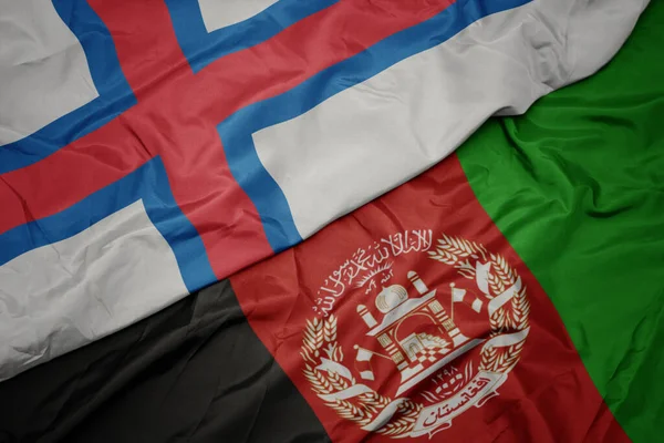 Размахивая Красочным Флагом Афганистана Национальным Флагом Фарерских Островов — стоковое фото