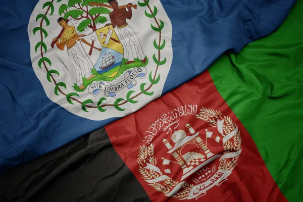 Schwenken Bunte Flagge Afghanistans Und Nationalflagge Von Belize — Stockfoto