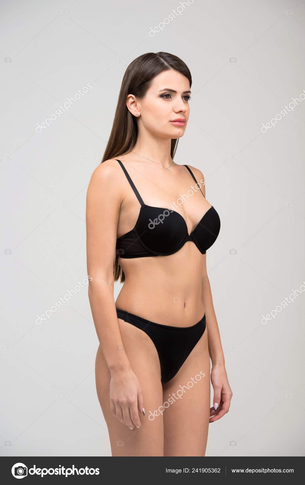 Three Quarter Portrait Beautiful Brunette Women Slim Figure Black Bra Stock  Photo by ©Yarkovoy 241905362