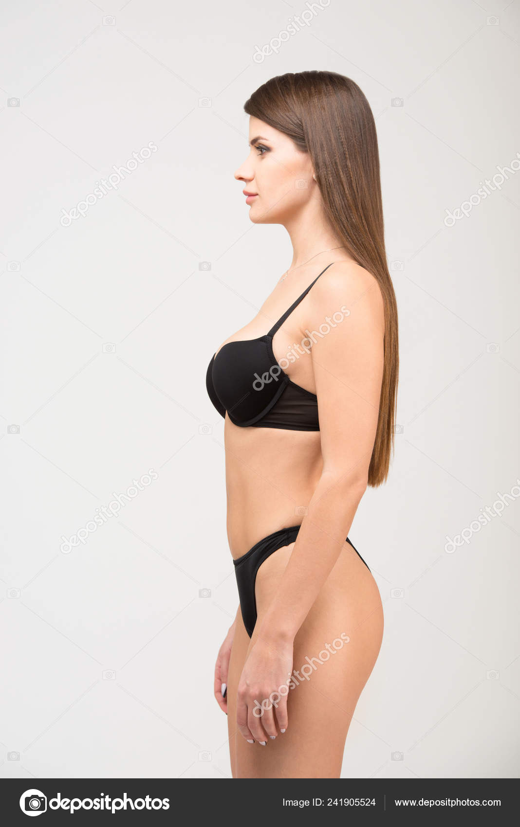 Close up portrait of beautiful brunette women with a slim figure