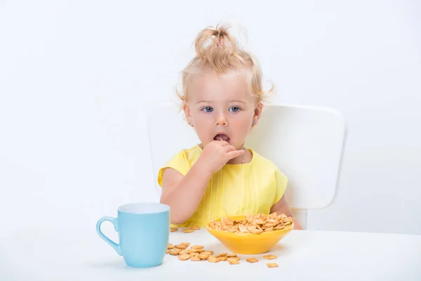 Little Blonde Baby Girl Year Old Yellow Shirt Eating Cereal — Stock Photo, Image