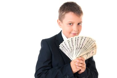 Para onun elinde tutan bir iş elbiseli genç girişimci çocuk okul çocuğu. İlk milyon dolar kazanmak için nasıl