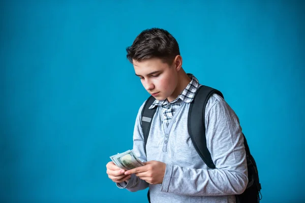 Cash loan, first easy money and spending money. The boy teenager — Stock Photo, Image