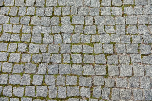 stone pavement, stone road in the old town, stone background, texture